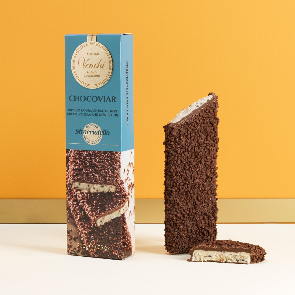 Chocolate stick filled with cream, nibs and vanilla beans and covered with milk chocolate. Gluten free. Shop now!