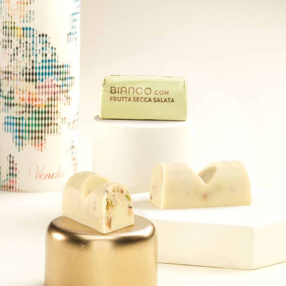 White chocolate with crunchy chopped PGI Piedmont Hazelnuts, almonds and lightly salted and toasted pistachios. Gluten free. Buy online!